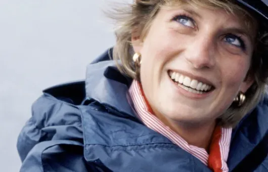 Diana smiling on boat with jacket